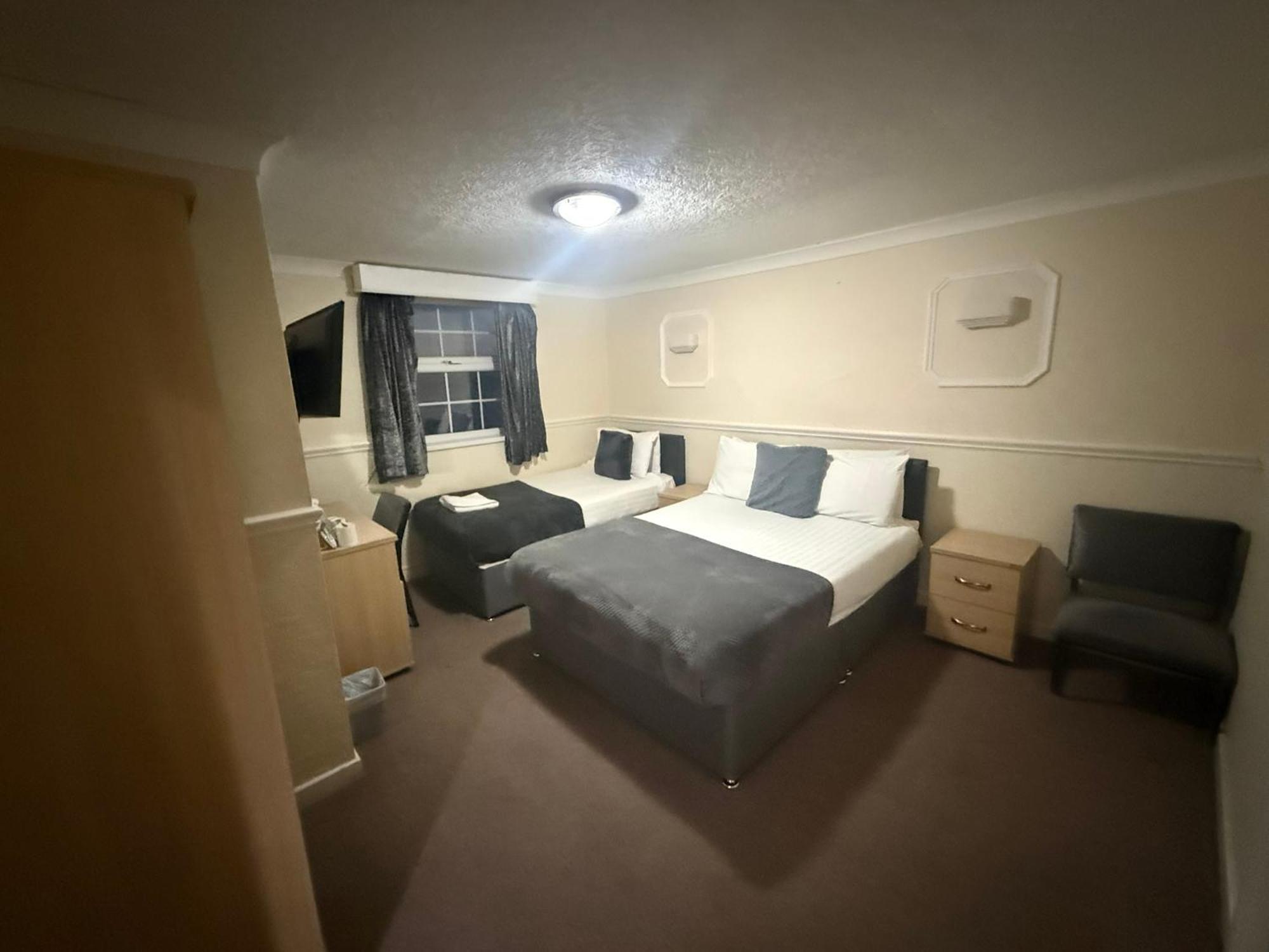 Dreibettzimmer mit Meerblick
